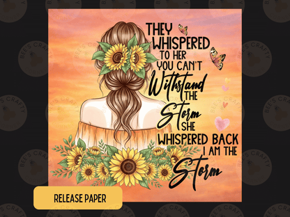 The image is a digital illustration featuring a woman with long hair and sunflowers, accompanied by text that reads "They whispered to her you can't withstand the storm she whispered back I am the storm".