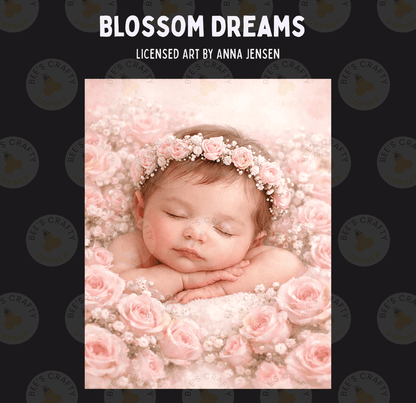 A sleeping baby swaddled in a pink flower crown is surrounded by a bed of pink roses.