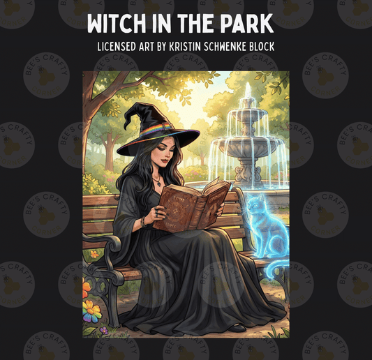 A woman dressed as a witch is sitting on a bench in a park, reading a book.