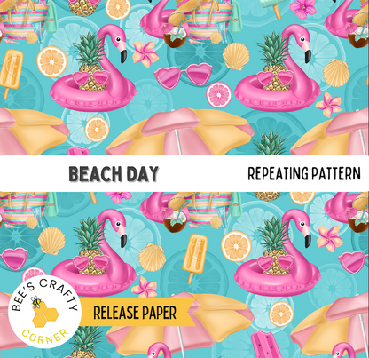 The image is a repeating pattern featuring various beach-themed objects such as flamingos, umbrellas, and fruits like oranges and pineapples. The pattern includes the words "BEACH DAY" and "REPEATING PATTERN" along with the text "RELEASE PAPER" and "Bee's Crafty Corner".