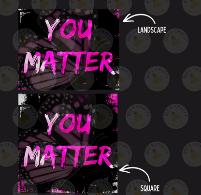 a large text that says "YOU MATTER" in a bold, pink font against a black background. The text is surrounded by a pattern of butterflies and other abstract shapes. There is also a small text bubble next to the "YOU MATTER" text, indicating "LANDscape".