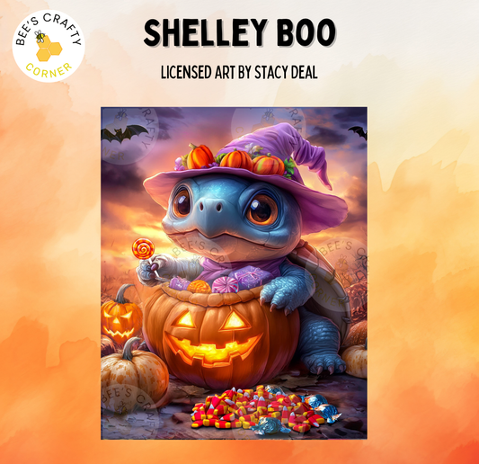 The image is a Halloween-themed illustration featuring a blue turtle wearing a witch's hat and holding a carved pumpkin, surrounded by candy and pumpkins.