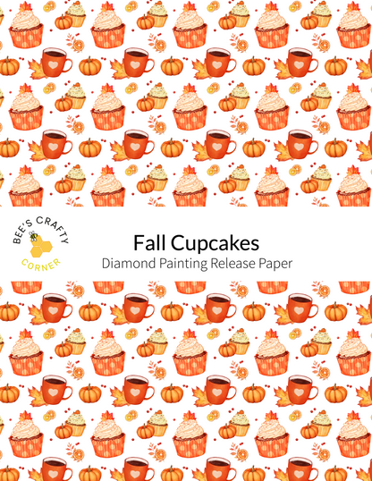 The image is a repeating pattern of fall-themed cupcakes and autumn leaves, with various sizes and colors of cupcakes and leaves scattered throughout the background.