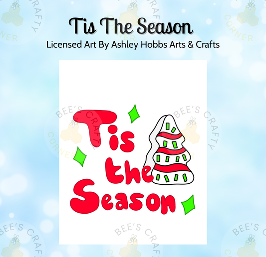 The image is a collage of various Christmas-themed images, including a Christmas tree, snowflakes, and other festive elements. The main focus of the image is the phrase "Tis The Season" written in a stylized font, which appears to be a creative and festive design element.