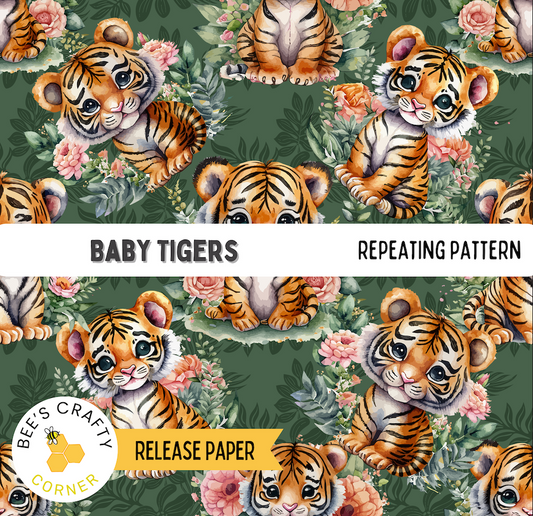 The image is a repeating pattern of baby tiger illustrations on a green background with pink flowers.