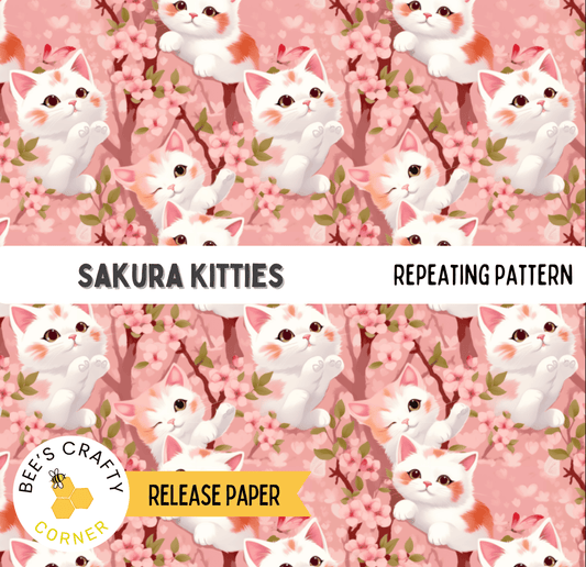 The image is a repeating pattern of white and orange cats sitting on branches with pink flowers.