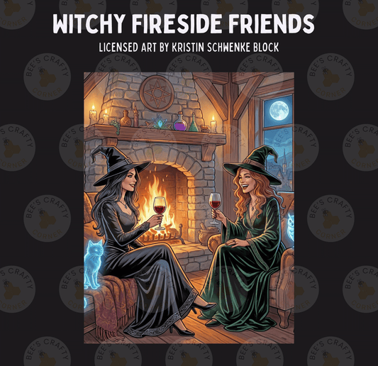 two women dressed as witches sitting in a cozy fireplace, each holding a glass of wine.