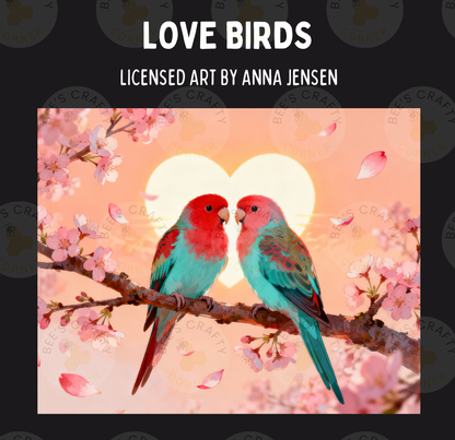 two colorful parrots perched on a branch, with a heart-shaped background featuring pink flowers and a sun-like glow.